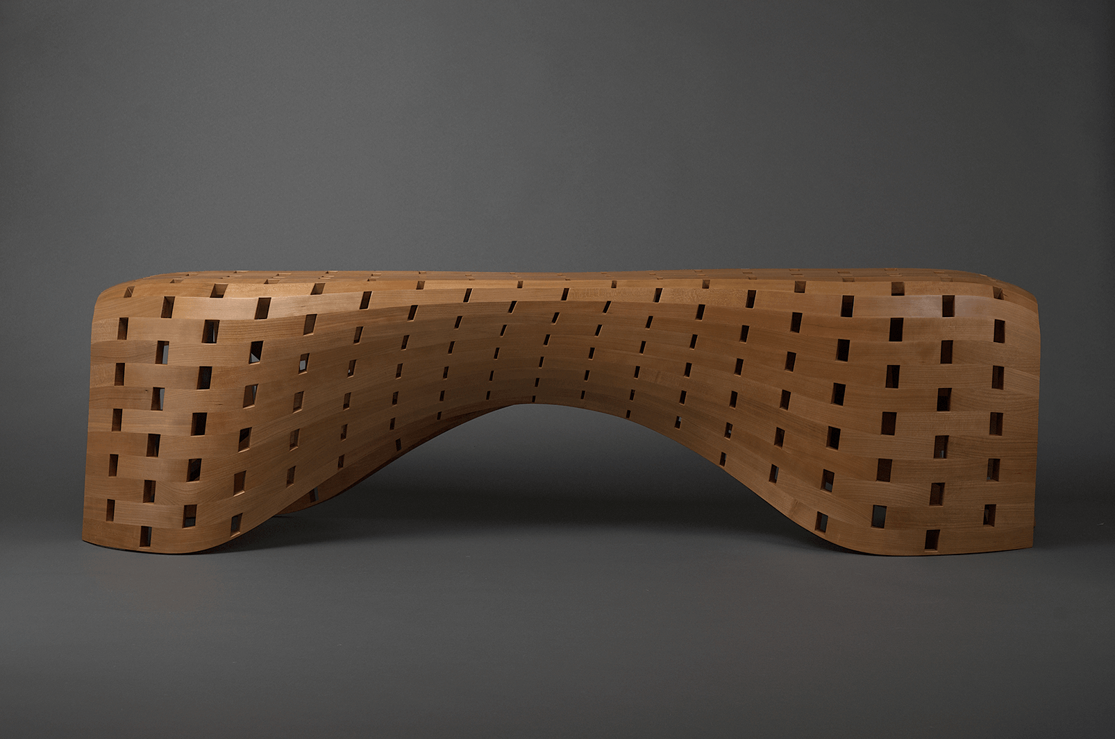 The Peanut Bench, a coopered wooden bench made with Rhino